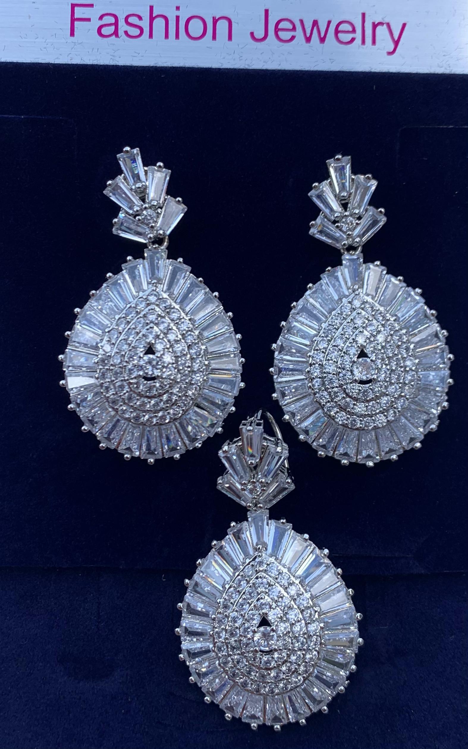 Steel Earring And Necklace Cord.
